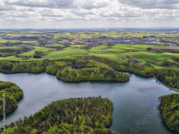 Obraz Aerial view of the Neyetalsperre (Neye Dam) in the Bergisches Land with a view of Wipperfürth in the background.