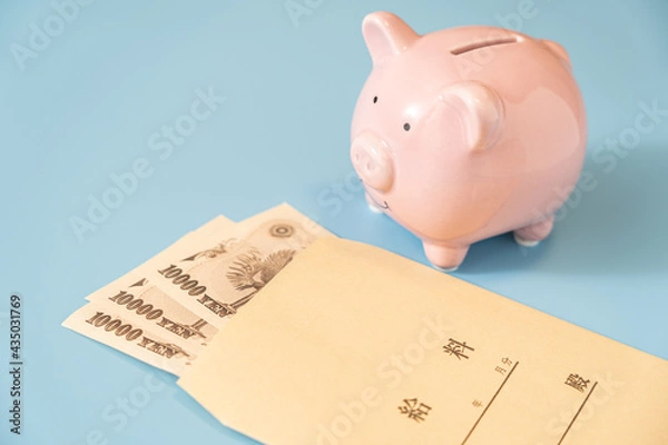 Fototapeta 給料袋と貯金箱