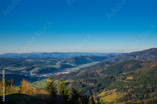 Fototapeta Germany, Panorama view above wide forested nature landscape of mountains and valleys from peak of hoernleberg with view down the elztal valley