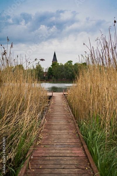 Obraz widok kościoła nad jeziorem 