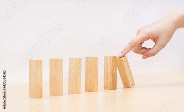 Obraz hand holding a block