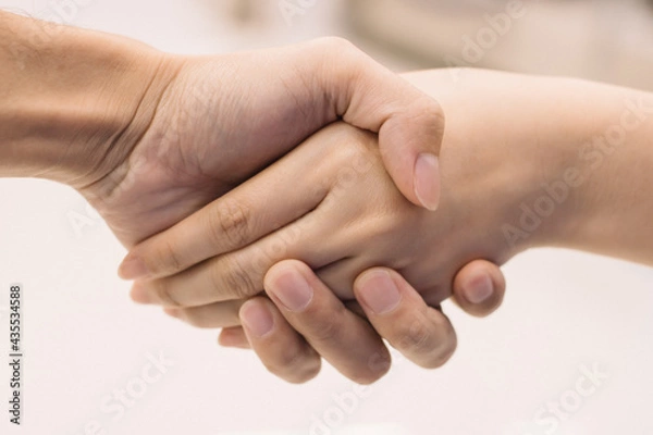 Fototapeta close up of handshake