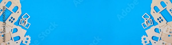 Fototapeta Banner Panorama Constructor Details on Blue Background Children's Game Prefabricated House.