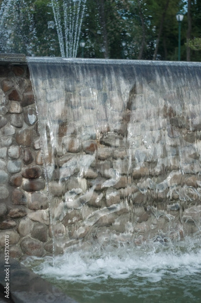 Fototapeta waterfall in the park, water fountain