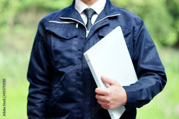 Fototapeta 作業服を着たビジネスマン