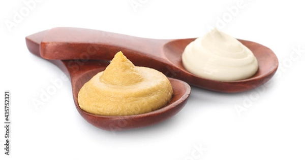 Fototapeta Spoons with mustard and mayonnaise on white background