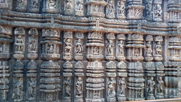 Fototapeta The beautiful sculptures of Konark sun temple  craved on stone built during 13th century,  situated at Konark, Odisha, India