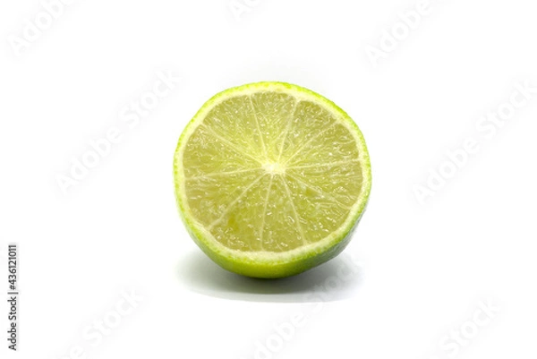 Fototapeta half green lemon on white background, half lemon on the white background, fruit on the white background