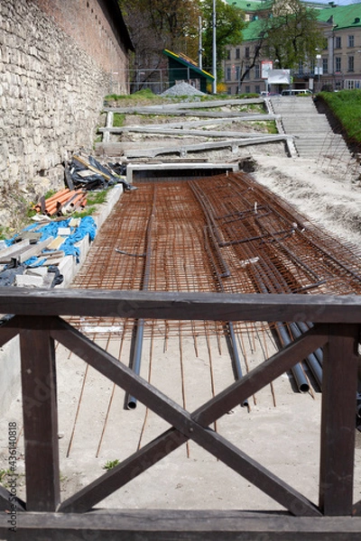 Obraz Equipment of the recreation area near the ancient wall