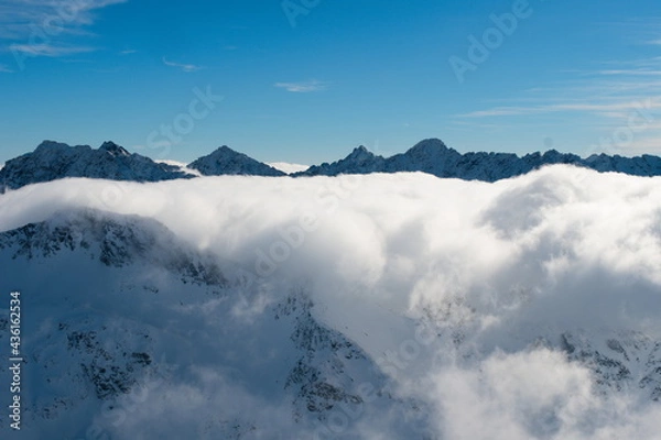 Obraz A sea of clouds in a mountain valley. Tatra Mountains Poland. The Valley of the Five Polish Ponds.