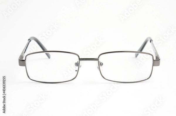 Obraz Optical eyeglasses on a white background.