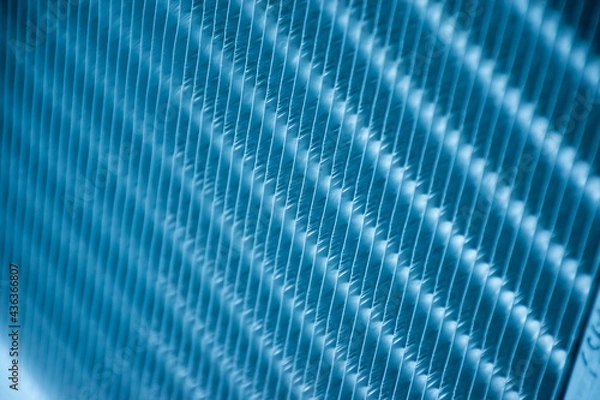 Fototapeta Close up aluminum fin of cooling condenser coil of air condition system. Pattern for abstract background.