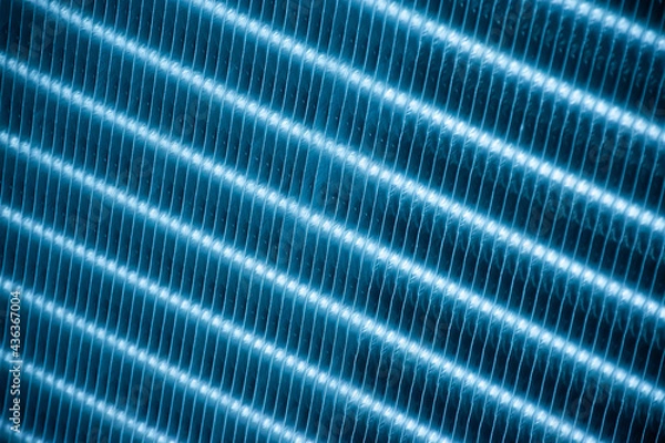 Fototapeta Close up aluminum fin of cooling condenser coil of air condition system. Pattern for abstract background.
