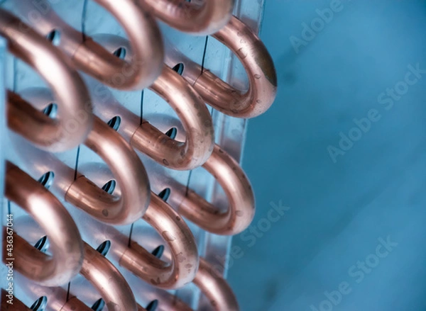Fototapeta Close up aluminum fin of cooling condenser coil of air condition system. Pattern for abstract background.