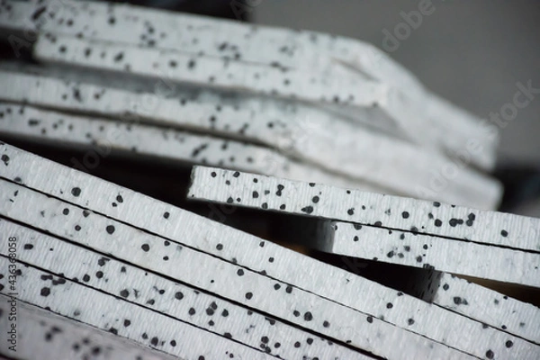 Fototapeta Stack of white and black expanded polystyrene(eps) foam sheets for shockproof.