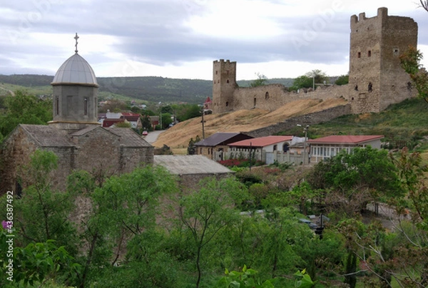 Fototapeta Crimean peninsula, the city of Feodosia. Towers of the Genoese Fortress (St. Clement, 1384 and Crisco 1348) Orthodox Church (1348)