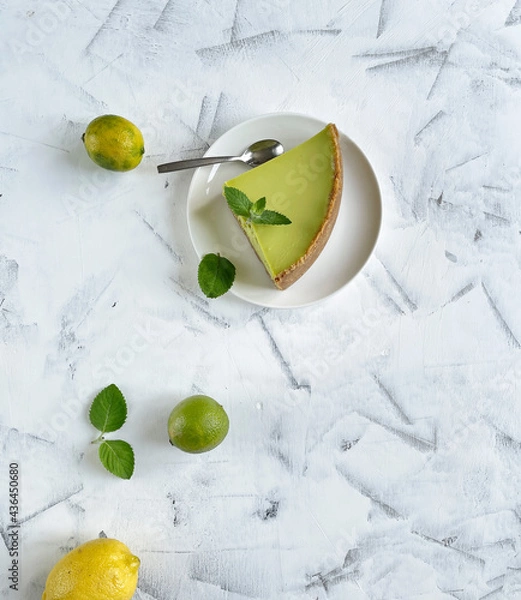 Obraz Lemon cheesecake  slice, top view, copy space.