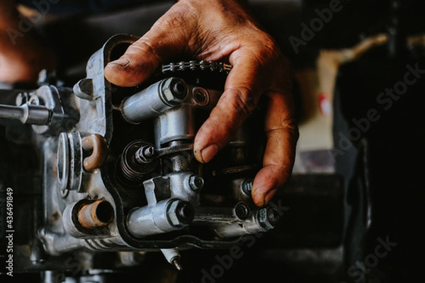 Obraz Motorcycle engine  small motorcycle  maintenance.