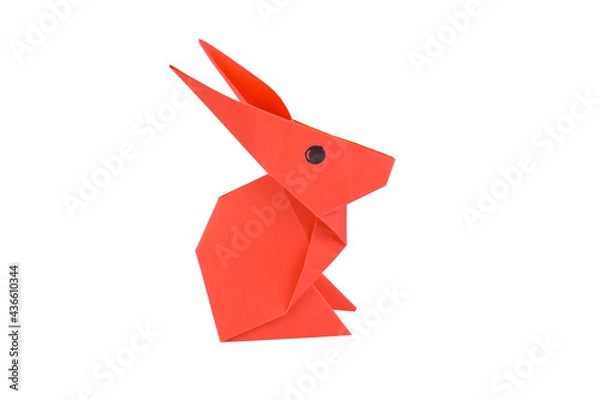 Fototapeta Rabbit made with small craft paper and nicely placed on a paper background