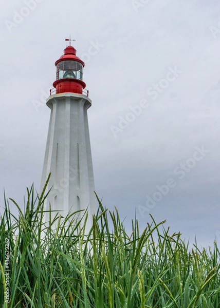 Fototapeta View on a rainy day on the Pointe au Pere lighthouse, located near Rimouski, Quebec  (Canada)