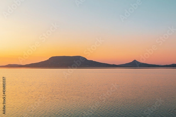 Obraz Beautiful panorama of Lake Balaton near the town of Fonyod, in the background the Badacsony Mountains and Szigliget at sunset