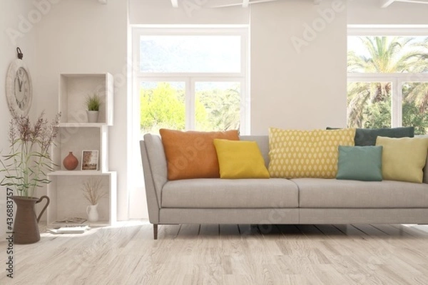 Fototapeta White living room with sofa and summer landscape in window. Scandinavian interior design. 3D illustration