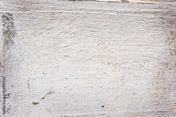 Fototapeta .Plastered wall of an old house with traces of weathering. Uneven gray surface. Grunge. Texture. Background. Copy space.