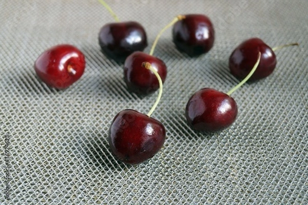 Obraz Ripe cherries berries on a gray background. Close-up 
