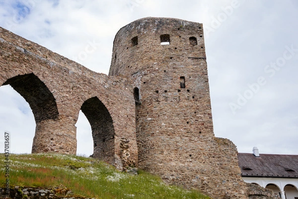 Fototapeta Gothic medieval castle Velhartice in sunny day, tower and stone arch bridge, fortress masonry wall, old stronghold, Velhartice, National Park Sumava, South Bohemia, Czech Republic