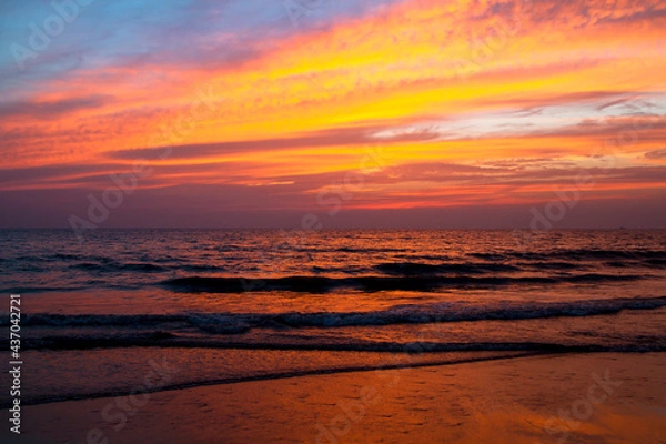 Fototapeta City's beach during sunset and dusk showing some magnificent colours