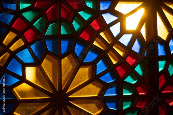 Obraz Photo of colored stained glass with colored light
