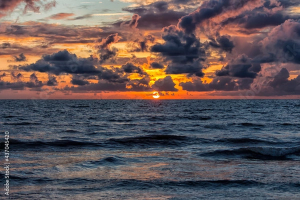 Fototapeta Clouds over a beach during pre-monsoon