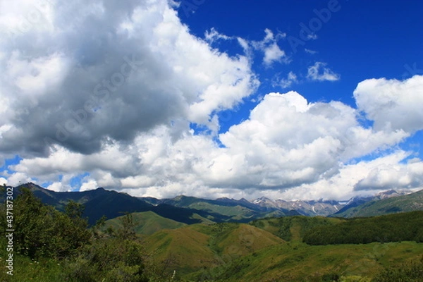 Fototapeta clouds over the mountains