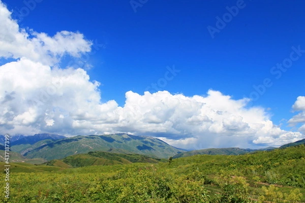 Obraz landscape with clouds over the mountains