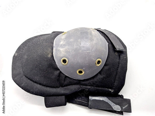 Obraz one old and shabby knee pad on a white background