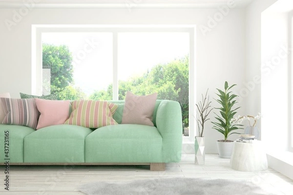 Fototapeta Minimalist living room in white color with sofa and summer landscape in window. Scandinavian interior design. 3D illustration