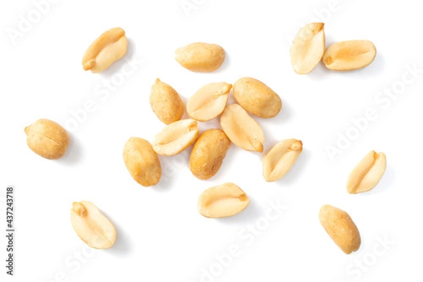 Fototapeta close up of roasted peanuts isolated on white background, top view