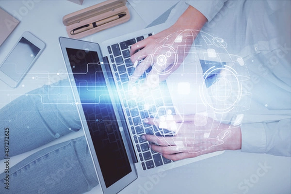 Fototapeta Double exposure of woman hands working on computer and social network theme hologram drawing. Top View. People connection concept.