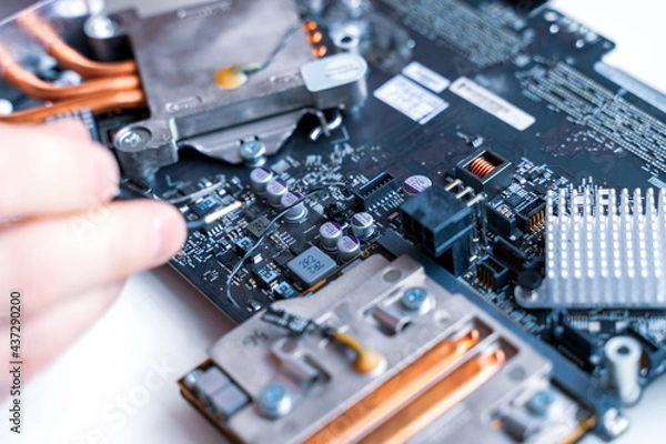 Obraz Computer chip electronic repair. Hardware engineer technology maintenance. Man technician pc service.