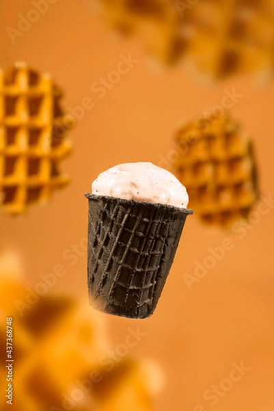 Obraz cream on a black background