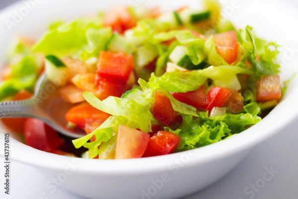 Obraz vegetable salad in a white plate