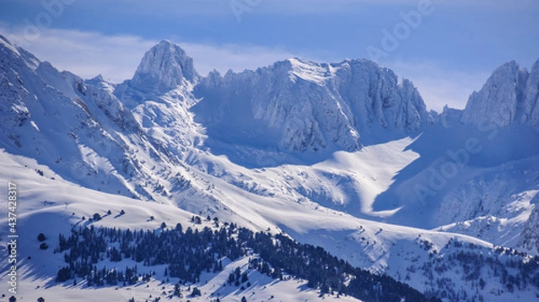 Fototapeta Detail of Aran mountains, seen from the town of Mont, in Mijaran, during winter (Aran Valley, Catalonia, Spain, Pyrenees)
