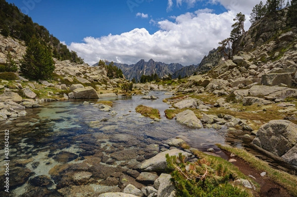 Obraz Ratera ravine and, in the background, the Encantats summits among the clouds (Sant Maurici, Catalonia, Spain, Pyrenees)