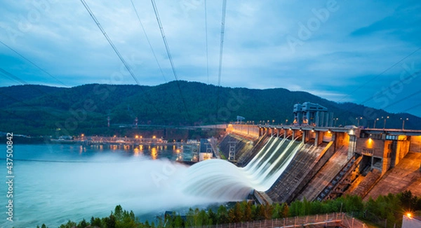Fototapeta view of the hydroelectric dam, water discharge through locks