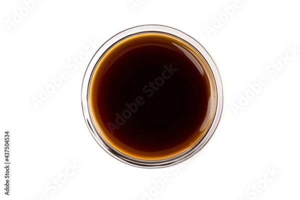 Obraz Dark caramel syrup or Soy sauce , isolated on white background. Top view.