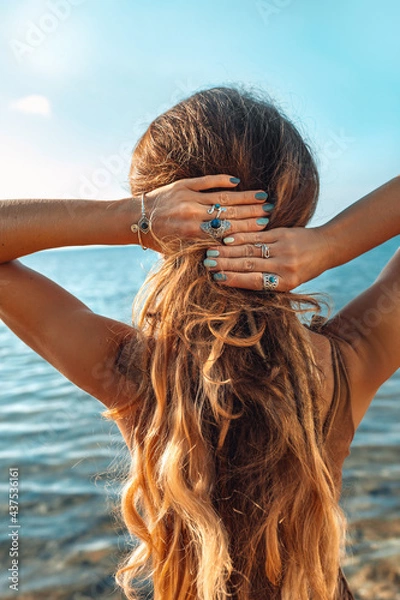 Obraz beautiful young woman at the beach