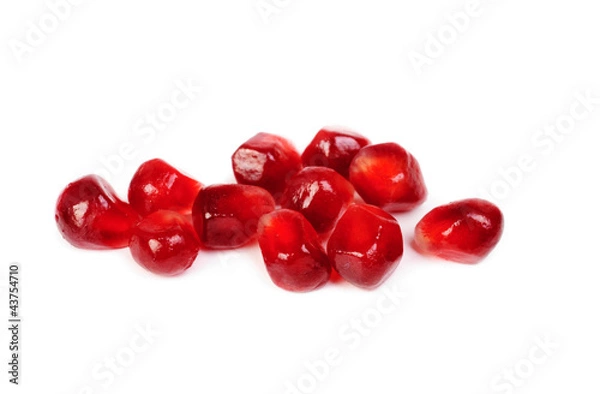 Fototapeta garnet seeds isolated on white background