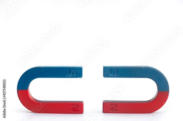 Fototapeta Horseshoe Magnet Bring the magnetic poles of the two magnets closer to each other. Poles of the same type repel each other. isolated on a white background
