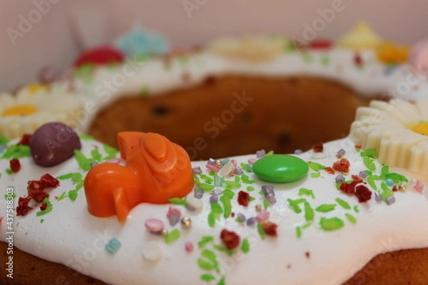 Fototapeta Yummy cake with icing and sprinkles. Spring cake. Easter cake.