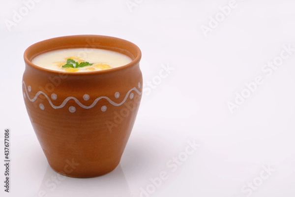 Fototapeta Indian style summer drink masala chach or raita made from buttermilk
